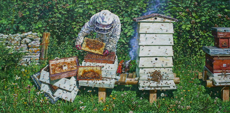 Image of a bee keeper with his bees